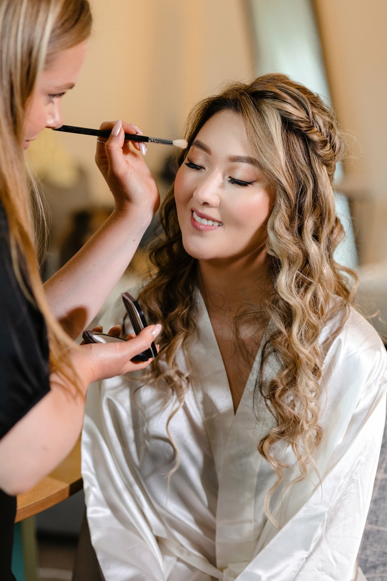 Bride getting ready at home with friends 2